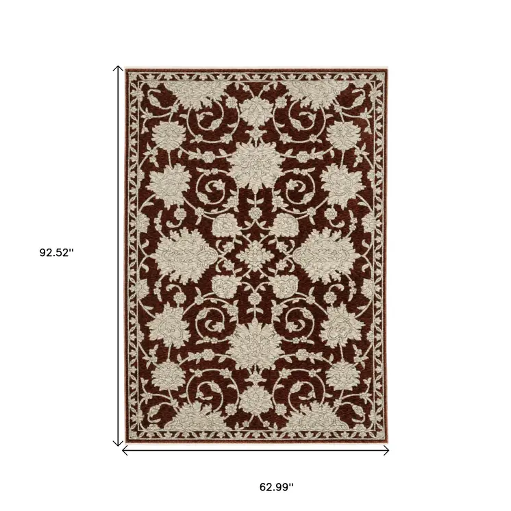 5' X 8' Beige Floral Area Rug With Fringe