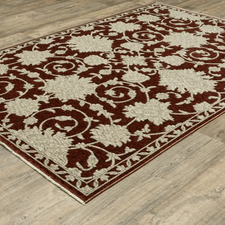 7' X 10' Beige Floral Area Rug With Fringe