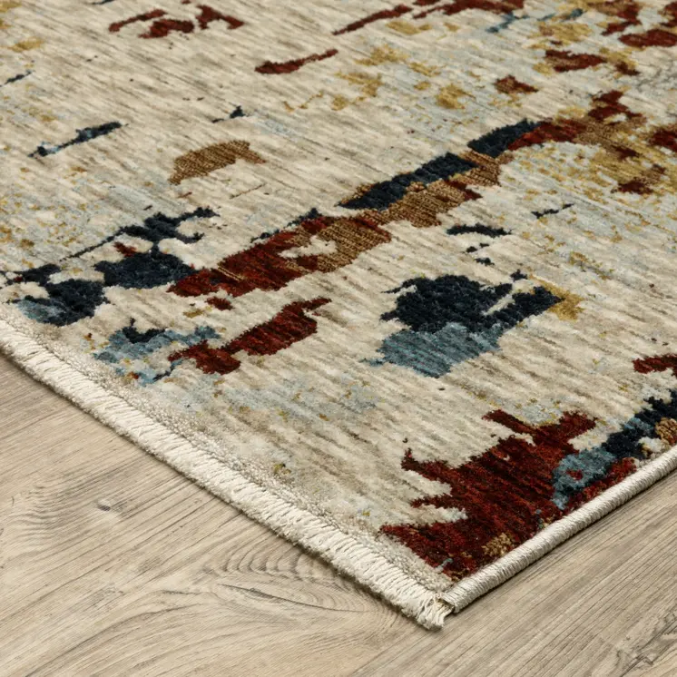 7' X 10' Beige Rust And Light Blue Abstract Distressed Area Rug With Fringe