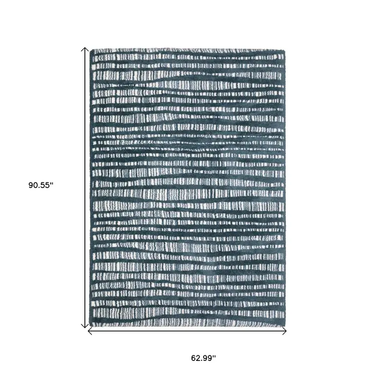5' X 8' Teal And Ivory Striped Distressed Area Rug