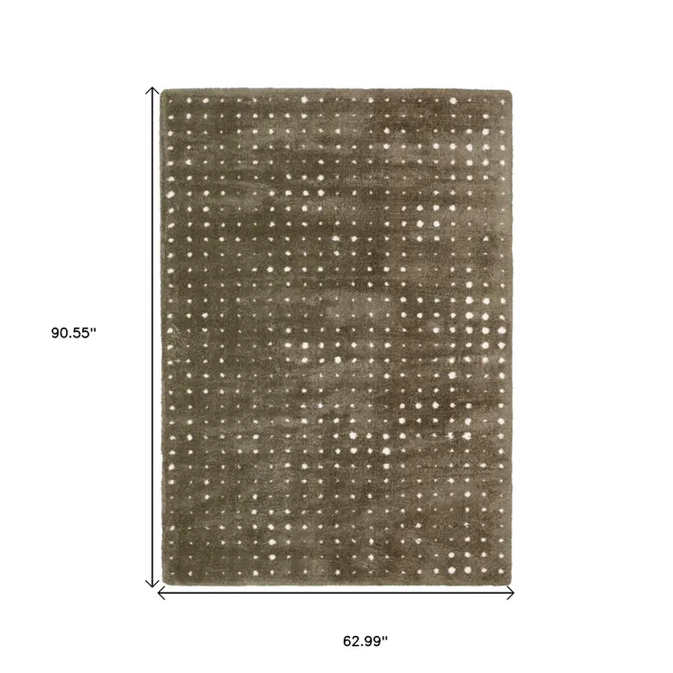 5' X 8' Brown And Ivory Geometric Area Rug