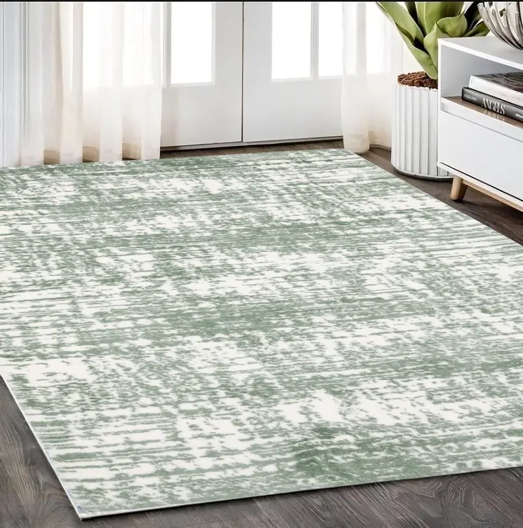 5' X 8' Green And Ivory Abstract Area Rug
