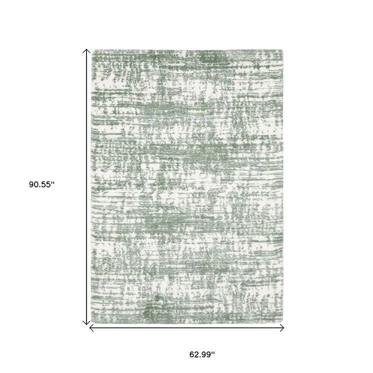 5' X 8' Green And Ivory Abstract Area Rug