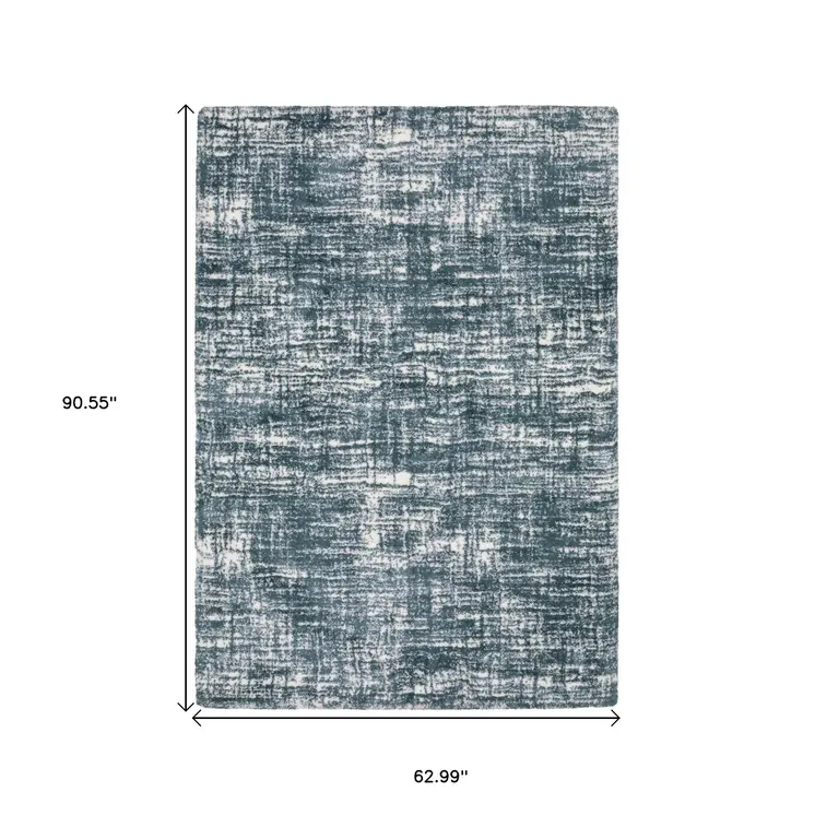 5' X 8' Gray And Ivory Geometric Area Rug