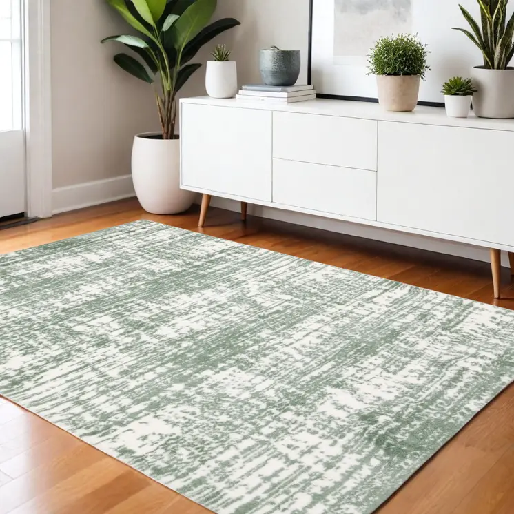 4' X 6' Green And Ivory Abstract Area Rug