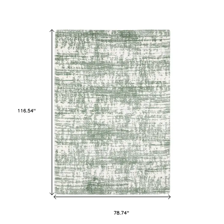 7' X 10' Green And Ivory Abstract Area Rug