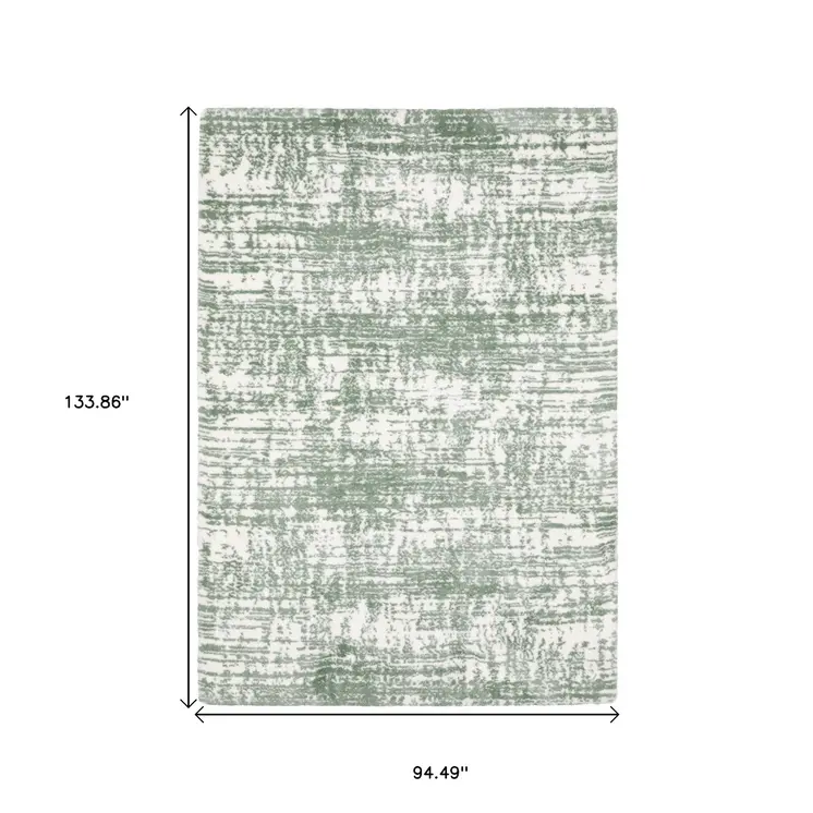 8' X 11' Green And Ivory Abstract Area Rug