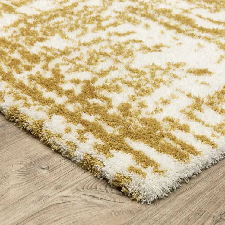 4' X 6' Gold And Ivory Abstract Area Rug