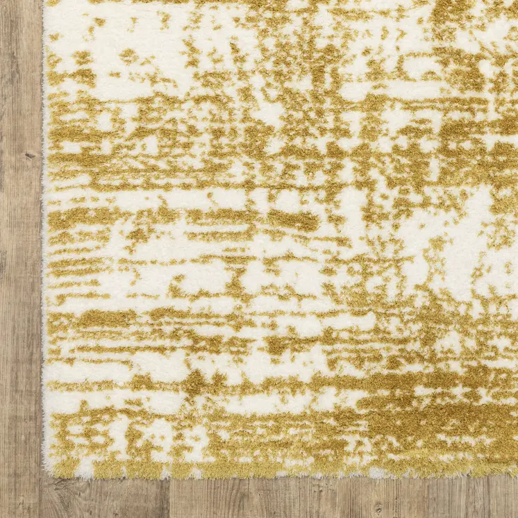 4' X 6' Gold And Ivory Abstract Area Rug
