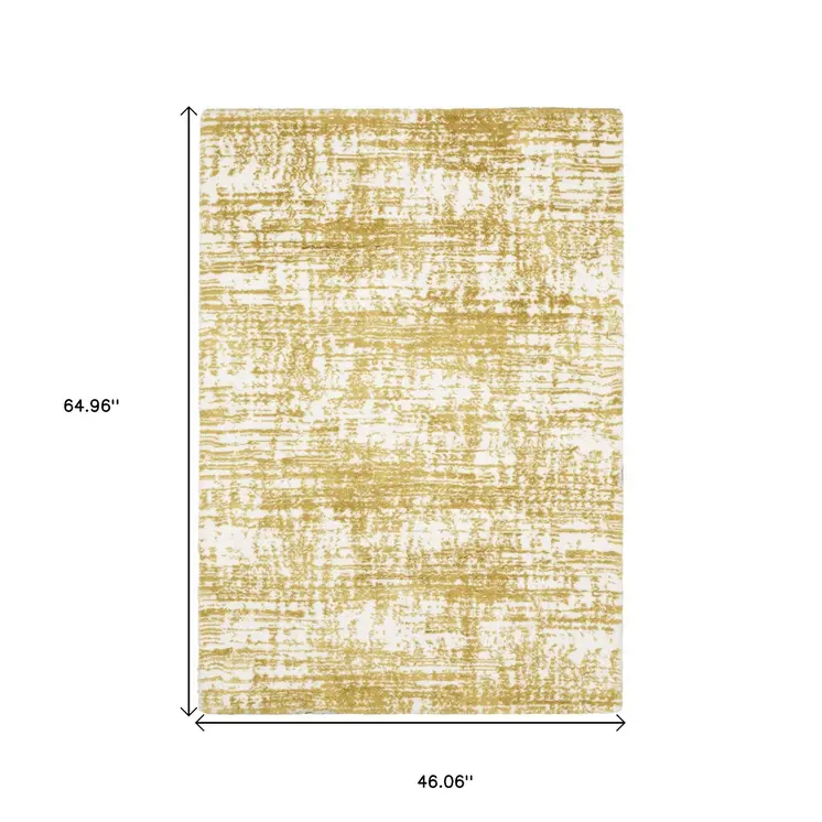 4' X 6' Gold And Ivory Abstract Area Rug