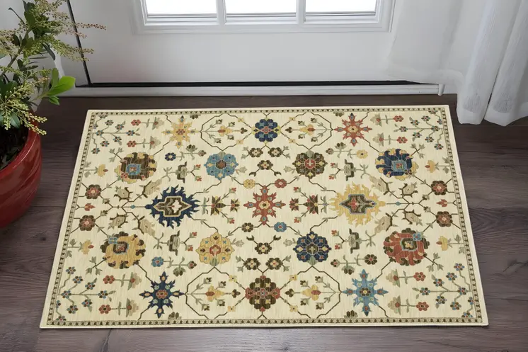 2' X 3' Ivory And Gold Oriental Area Rug With Fringe