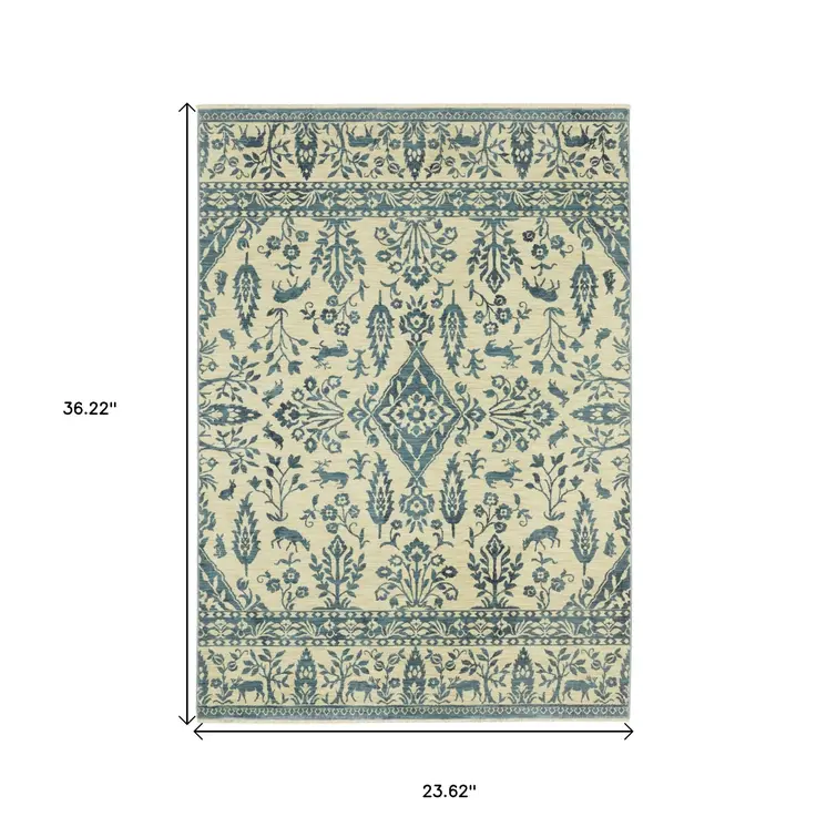 2' X 3' Ivory And Blue Oriental Area Rug With Fringe