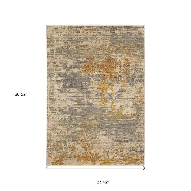 2' X 3' Beige And Gold Abstract Area Rug With Fringe