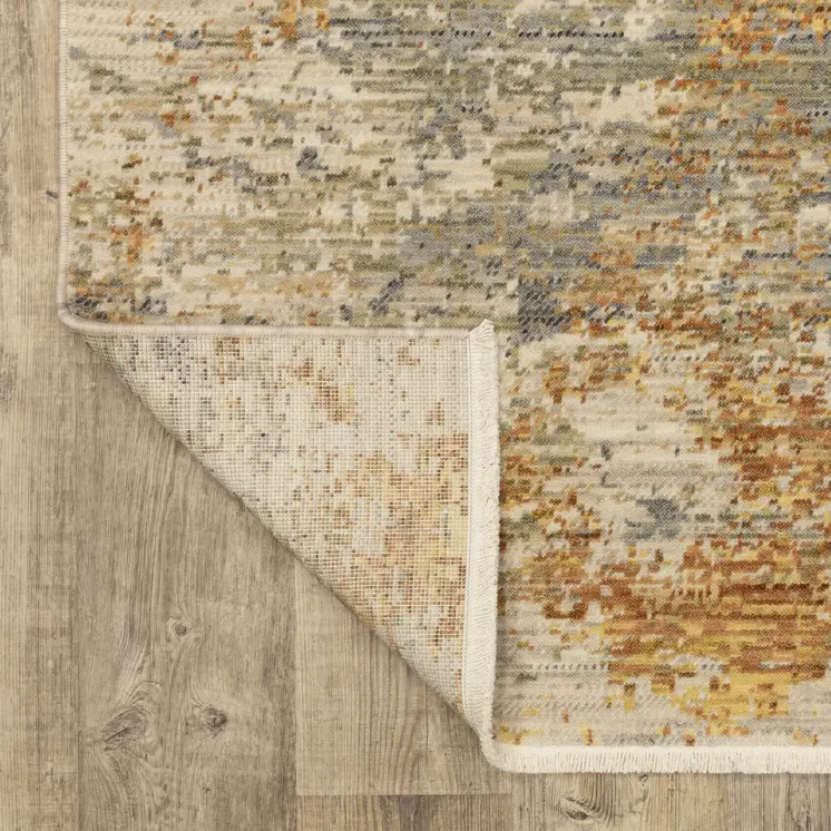2' X 3' Beige And Gold Abstract Area Rug With Fringe