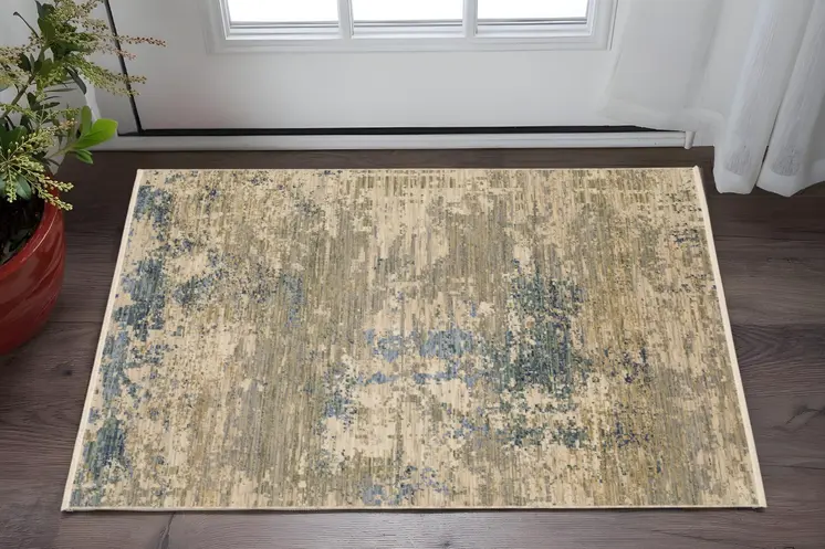 2' X 3' Beige And Blue Abstract Area Rug With Fringe