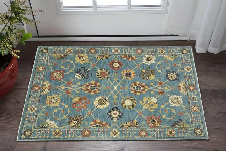 3' X 5' Blue Yellow And Dark Orange Oriental Area Rug With Fringe