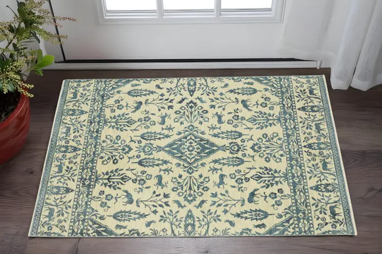 3' X 5' Ivory And Blue Oriental Area Rug With Fringe