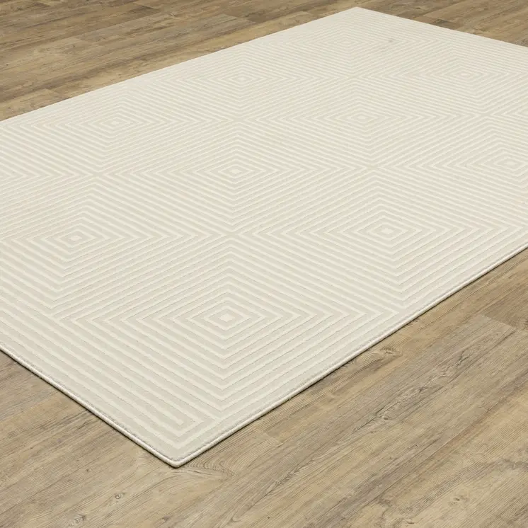 3' X 5' Ivory And Beige Geometric Area Rug