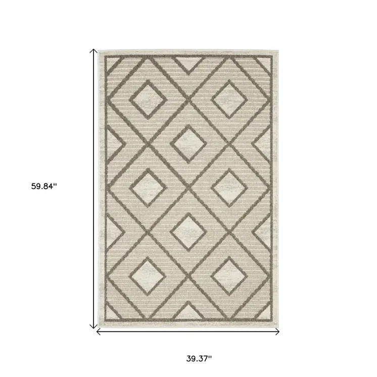 3' X 5' Beige And Brown Geometric Area Rug