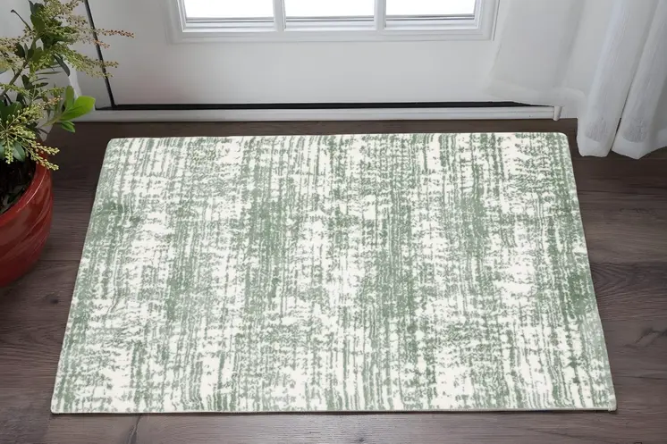 2' X 3' Green And Ivory Abstract Area Rug