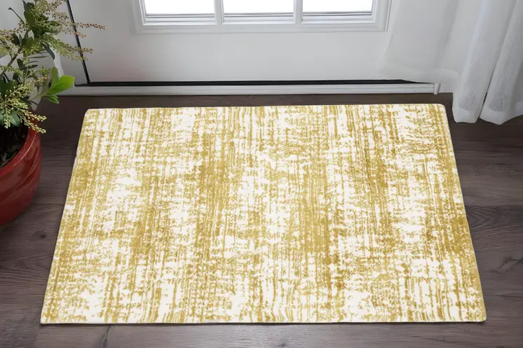 2' X 3' Gold And Ivory Abstract Area Rug