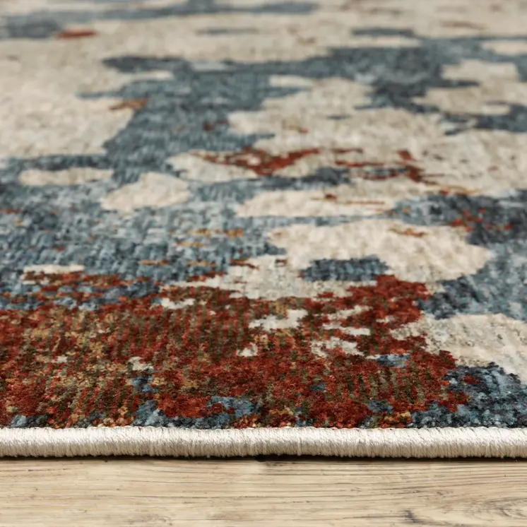 3' X 5' Beige Teal And Rust Abstract Area Rug With Fringe