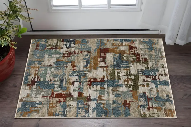 3' X 5' Beige Teal And Brown Abstract Area Rug With Fringe
