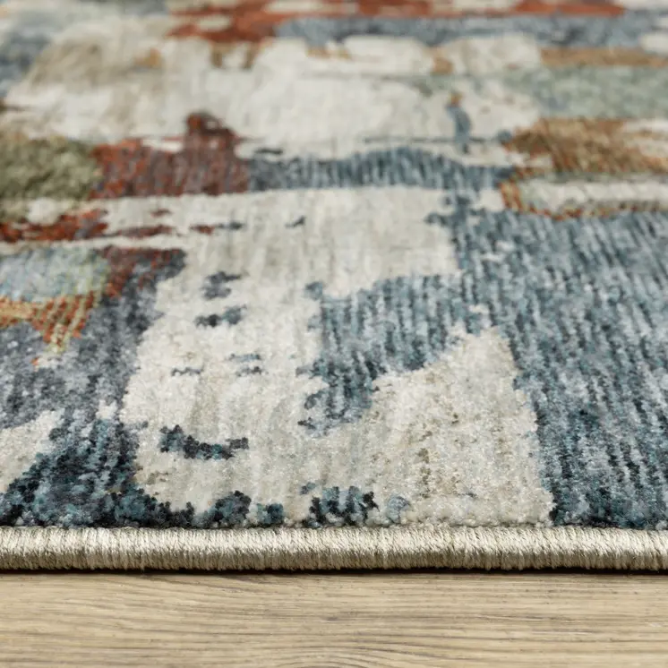 3' X 5' Beige Teal And Brown Abstract Area Rug With Fringe