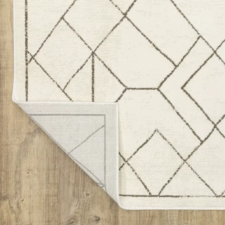 8' Ivory And Taupe Geometric Runner Rug