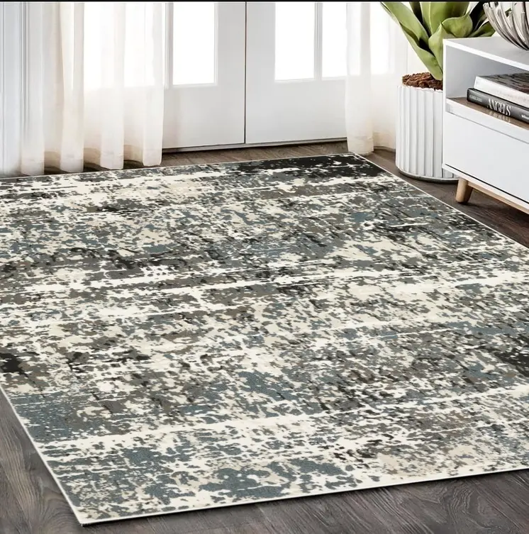 5' X 8' Gray And Ivory Abstract Area Rug