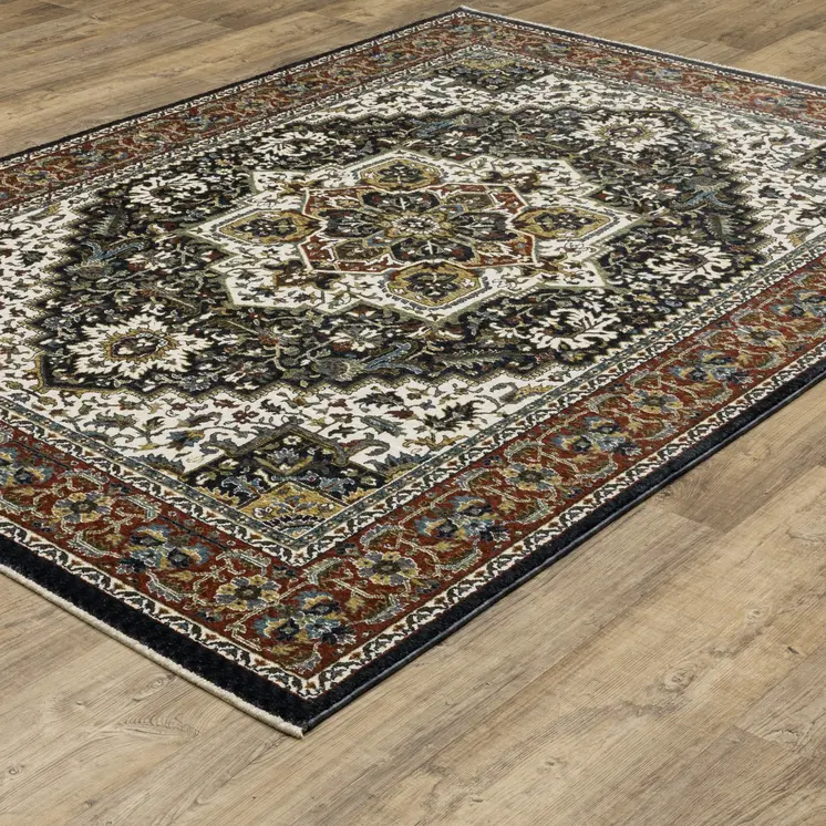 4' X 6' Navy Blue Ivory And Black Medallion Area Rug With Fringe