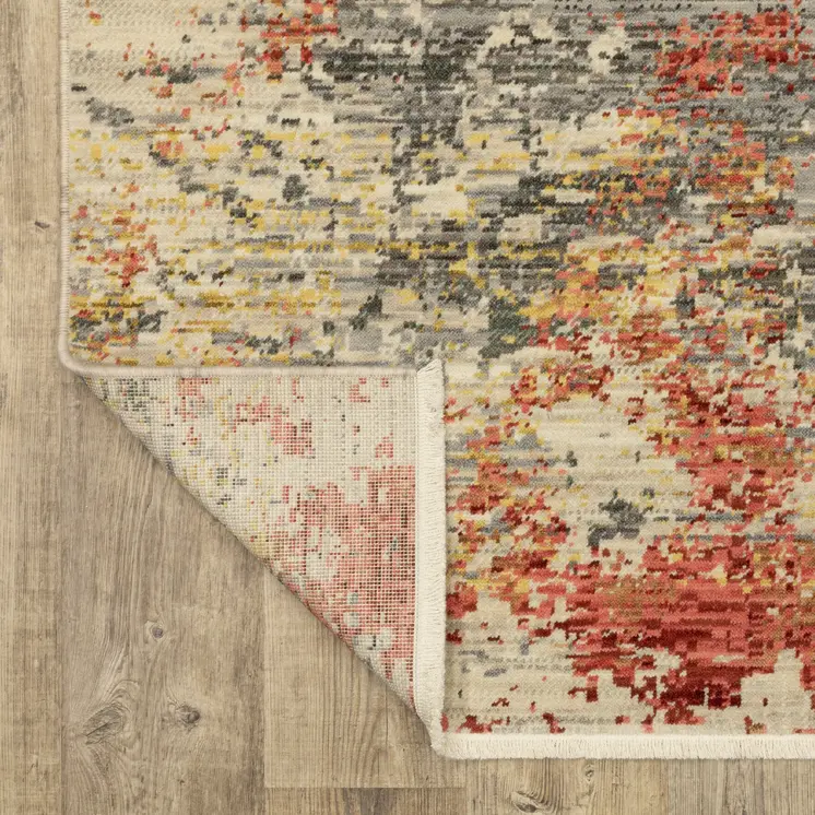 3' X 5' Beige And Pink Abstract Area Rug With Fringe