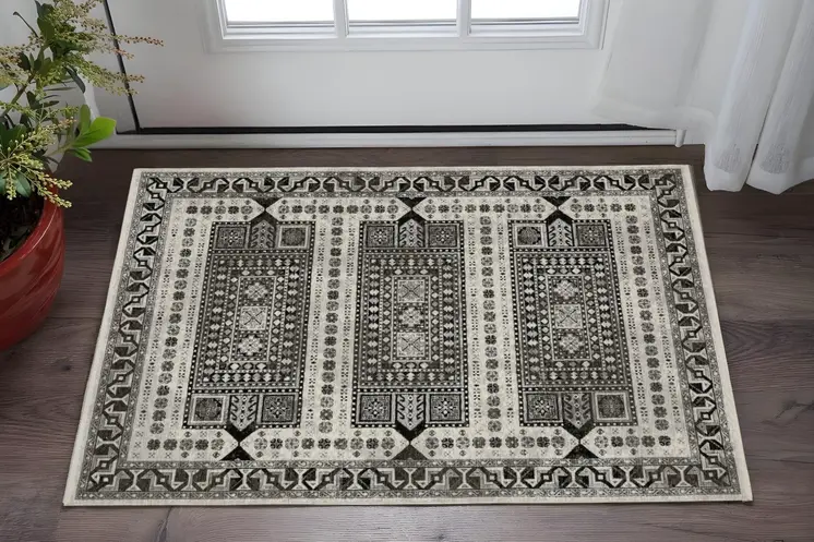 3' X 5' Ivory And Charcoal Oriental Area Rug With Fringe