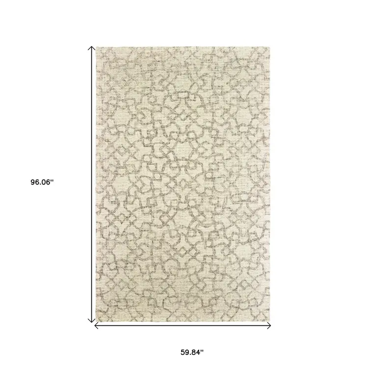5' X 8' Tan And Ivory Wool Geometric Hand Tufted Area Rug