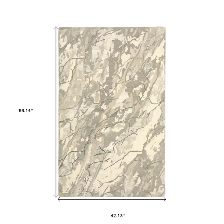 4' X 6' Beige And Ivory Wool Abstract Hand Tufted Area Rug