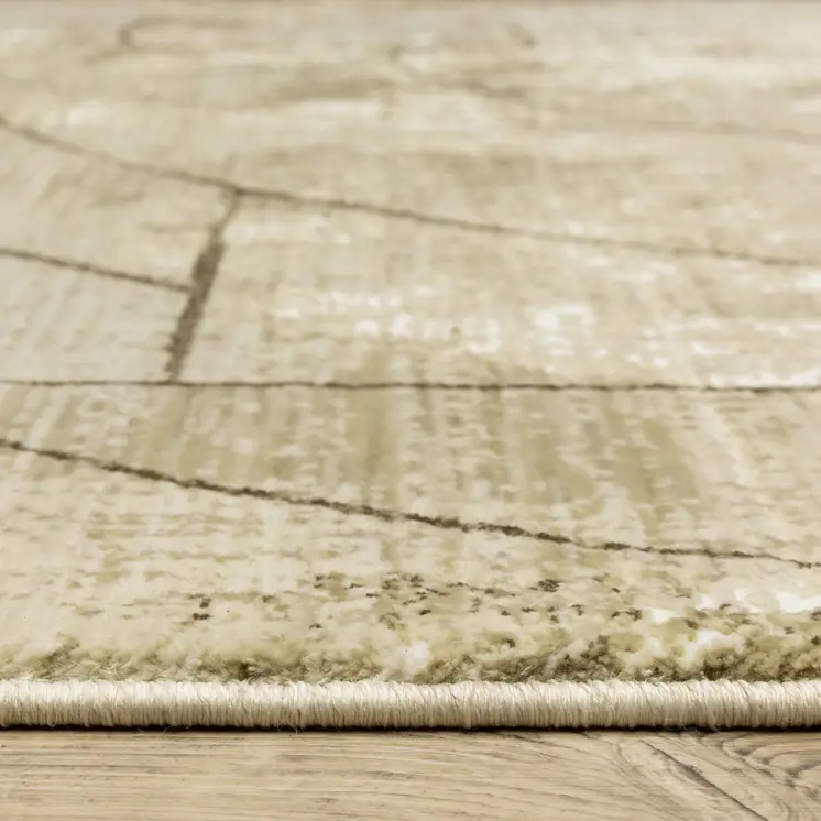 5' X 8' Beige And Brown Geometric Area Rug