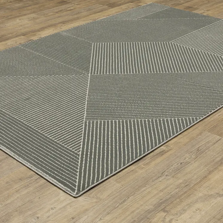 7' X 10' Gray And Ivory Geometric Area Rug