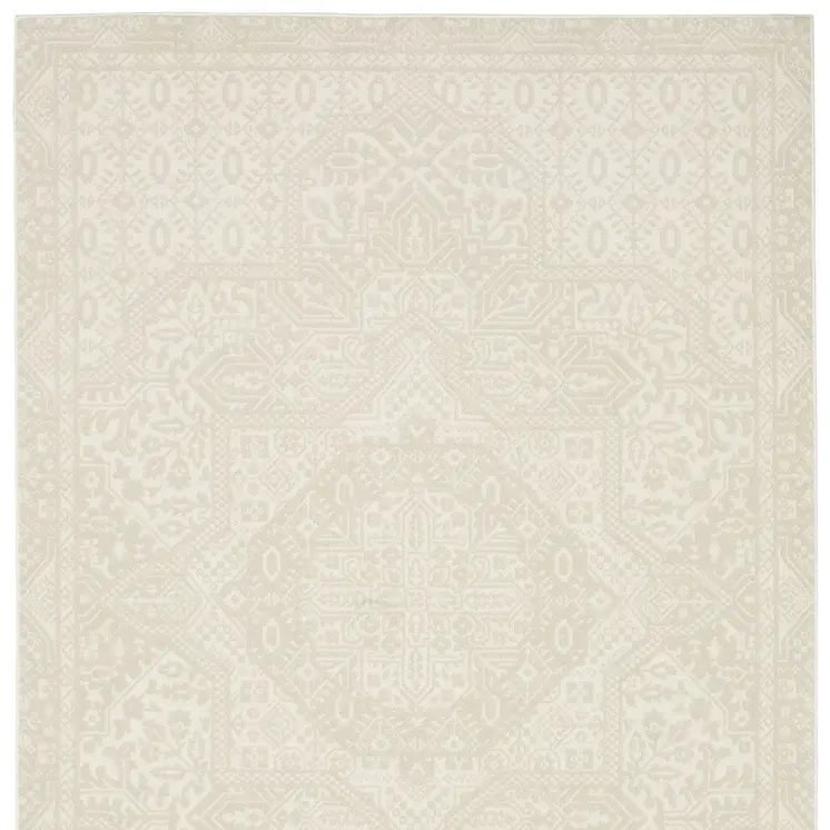 7' X 10' Ivory And Beige Medallion Area Rug