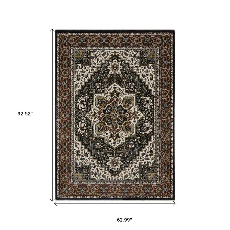 5' X 8' Navy Blue Black And Tan Medallion Area Rug With Fringe