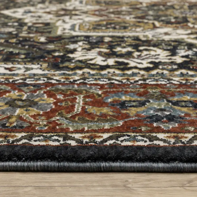5' X 8' Navy Blue Black And Tan Medallion Area Rug With Fringe