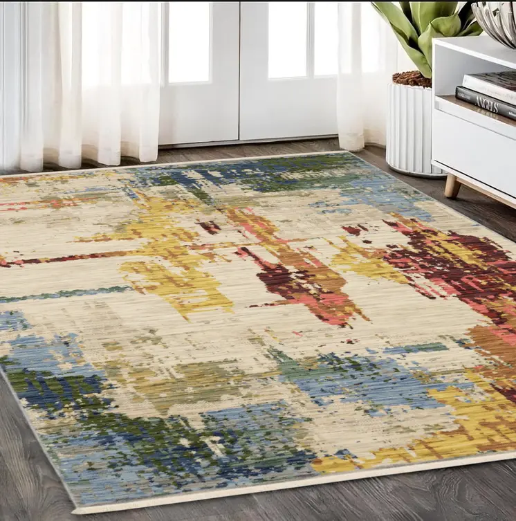 5' X 8' Beige Yellow And Salmon Abstract Area Rug With Fringe