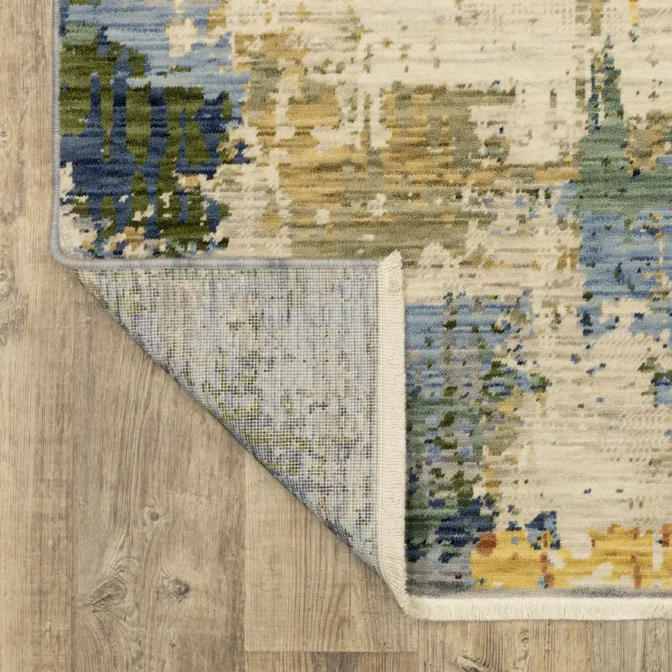 5' X 8' Beige Yellow And Salmon Abstract Area Rug With Fringe
