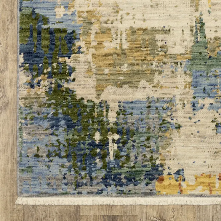 5' X 8' Beige Yellow And Salmon Abstract Area Rug With Fringe