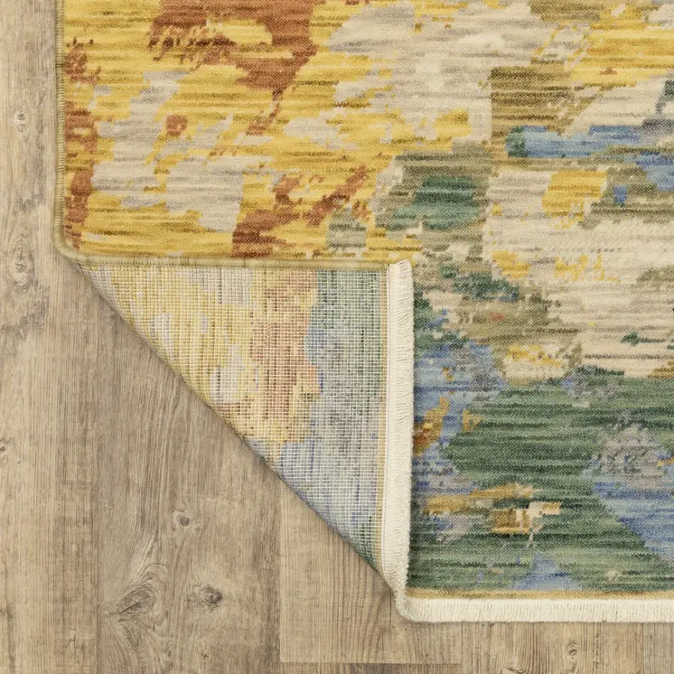 5' X 8' Beige Yellow And Rust Abstract Area Rug With Fringe