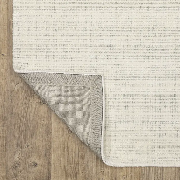 5' X 8' Ivory And Gray Striped Hand Tufted Area Rug