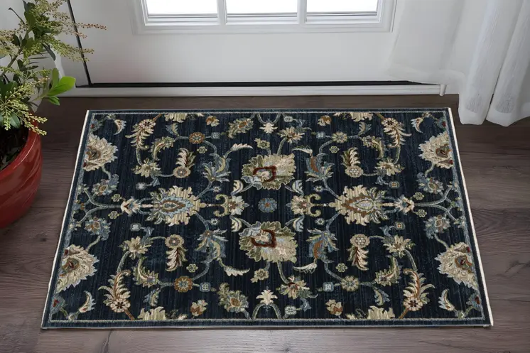 3' X 5' Navy Blue Tan And Teal Oriental Area Rug With Fringe