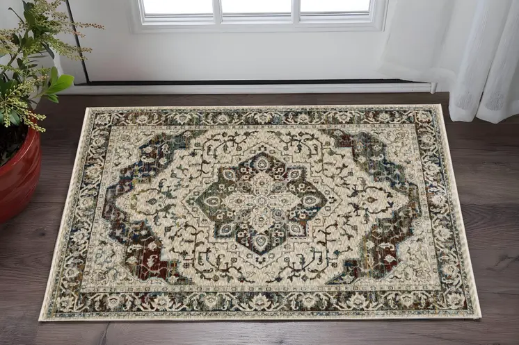3' X 5' Beige Rust And Blue Medallion Area Rug With Fringe