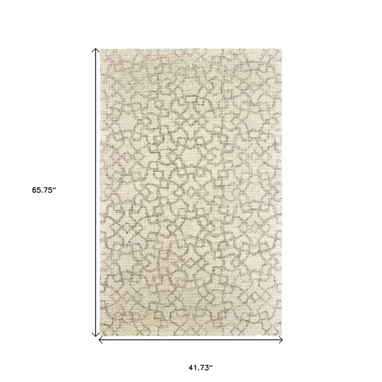 4' X 6' Tan And Ivory Wool Geometric Hand Tufted Area Rug
