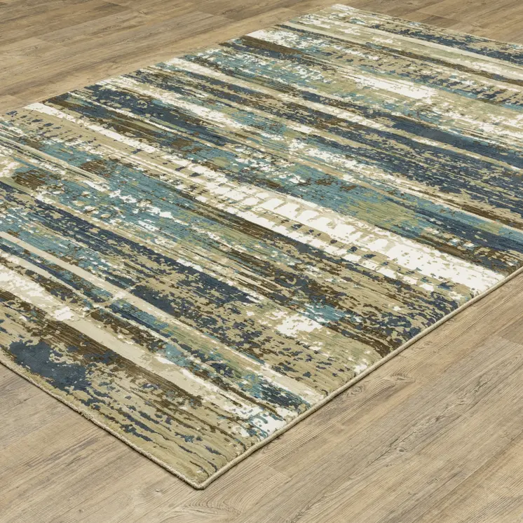 7' X 10' Beige And Blue Abstract Area Rug