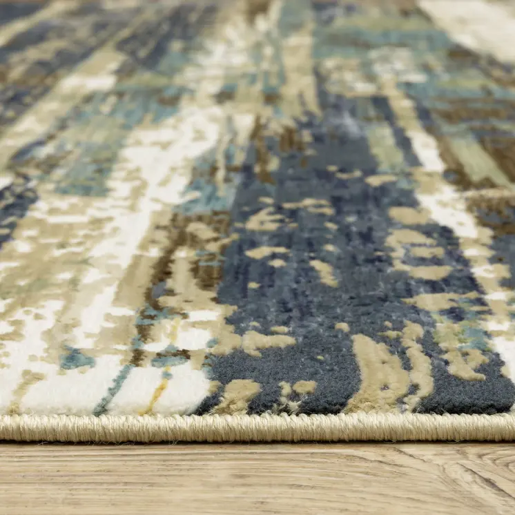 7' X 10' Beige And Blue Abstract Area Rug